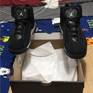 Up and down Black Air Jordan Sneakers